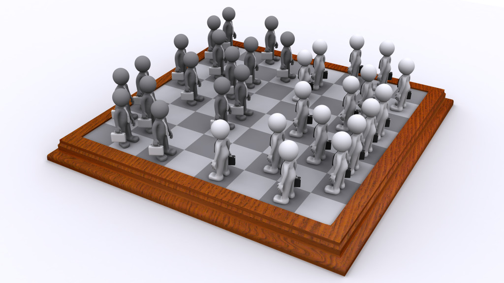 A Chess board of Business people. Business strategy concept
